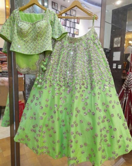 Attractive Pastel Green Tapeta Silk Foil Mirror Work Lehenga Choli With Dupatta